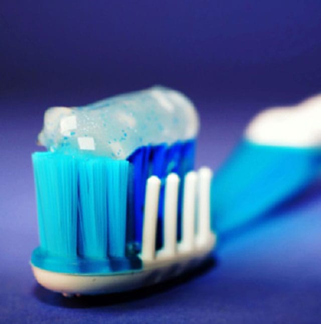 Booth brush with paste on it